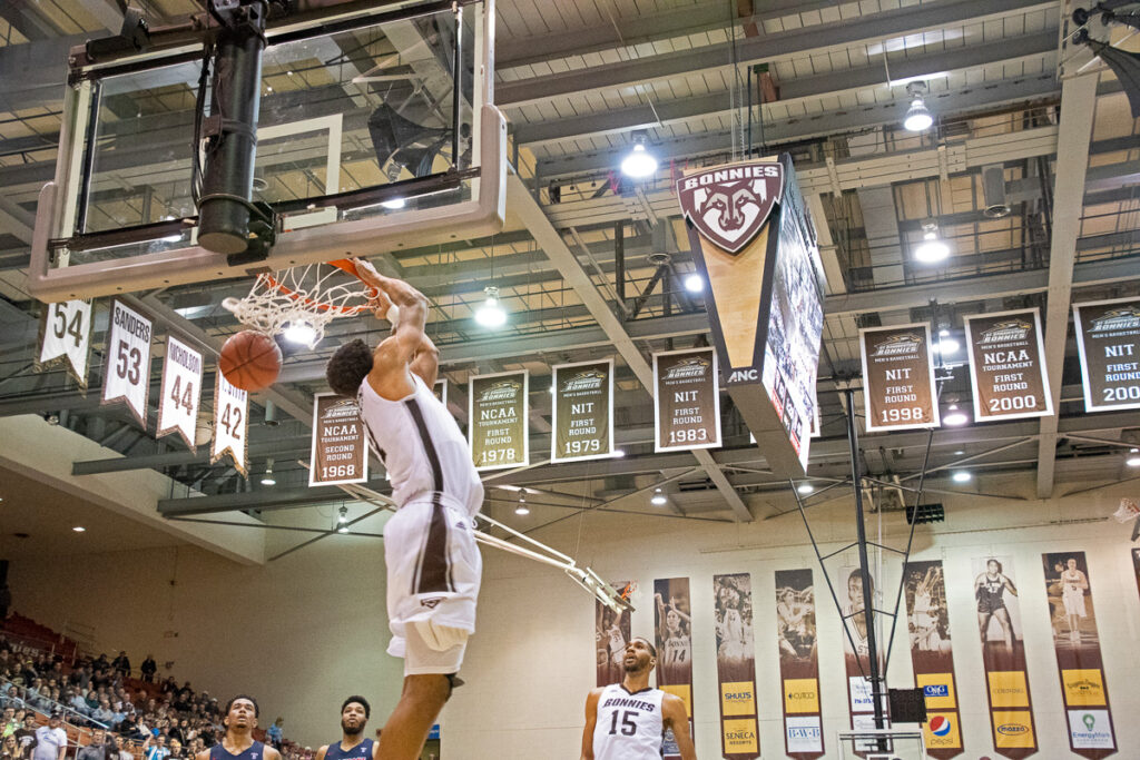 Courtney Stockard completes a reverse slam for the St. Bonaventure University Bonnies during a win against the Duquesne University Dukes
