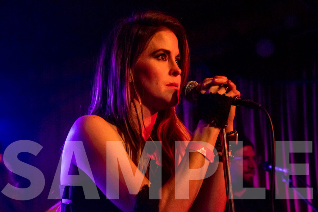 American Idol finalist Leslie Hunt performing with her band District 97 at Arlene's Grocery in New York City. Photograph copyright 2022 by Paul G. Barretta